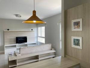 Televisyen dan/atau pusat hiburan di Bexp Spaces | Igloo Alphaville