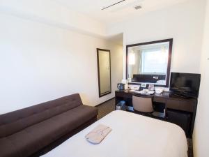 TV a/nebo společenská místnost v ubytování Hearton Hotel Higashi-Shinagawa