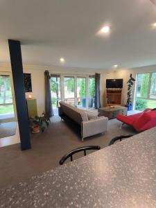 Postel nebo postele na pokoji v ubytování Vibrant Living Retreat