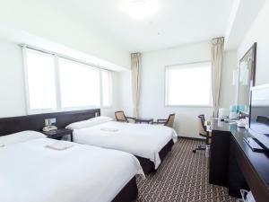 TV a/nebo společenská místnost v ubytování Hearton Hotel Higashi-Shinagawa