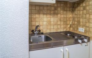 Kuchyňa alebo kuchynka v ubytovaní Schoene Ferienwohnung Fuegen