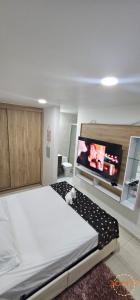 Postel nebo postele na pokoji v ubytování Valparaíso Premier Loft Con Piscina