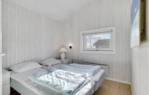 Postel nebo postele na pokoji v ubytování Holiday Home Lensg