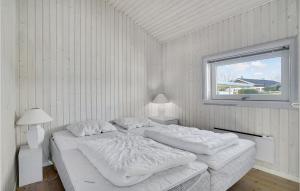 Postel nebo postele na pokoji v ubytování Holiday Home Lensg