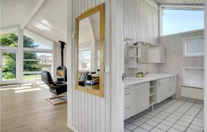 Kuchyň nebo kuchyňský kout v ubytování Holiday Home Lensg