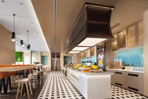 Istumisnurk majutusasutuses Home2 Suite by Hilton Hangzhou Qianjiang New Town