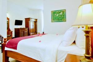 Ένα ή περισσότερα κρεβάτια σε δωμάτιο στο Kilandra 1 BR Bungalow JU47