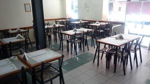 Um restaurante ou outro lugar para comer em Hotel Plaza Roma