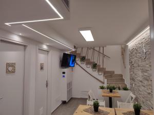 TV a/nebo společenská místnost v ubytování Casa Catalano