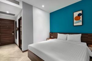 Postel nebo postele na pokoji v ubytování CHAU KHUONG HOTEL