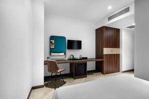TV a/nebo společenská místnost v ubytování CHAU KHUONG HOTEL