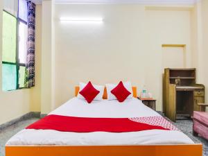 Voodi või voodid majutusasutuse Hotel O Smart View toas