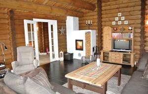 TV a/nebo společenská místnost v ubytování Holiday Home Hol With A Fireplace 02
