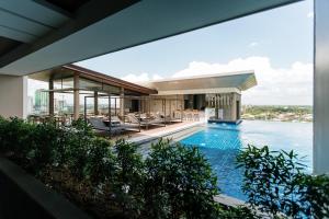 an image of a house with a swimming pool at Zuri Hotel in Iloilo City