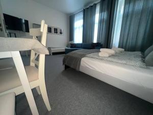 Postel nebo postele na pokoji v ubytování Koblenz Corner Rooms