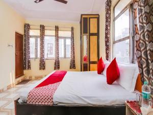 Voodi või voodid majutusasutuse Hotel O Smart View toas