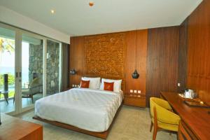 Ένα ή περισσότερα κρεβάτια σε δωμάτιο στο Roselle 1 BR Deluxe Ocean AN22