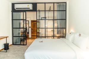 Letto o letti in una camera di Baan Ploy Sea