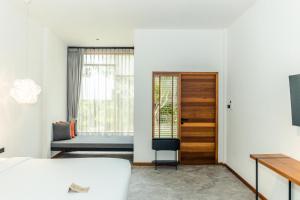 Letto o letti in una camera di Baan Ploy Sea