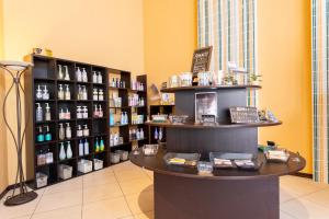 a store with shelves of products in a room at HOTEL Villamure Ogori -ADULT ONLY- in Tosu