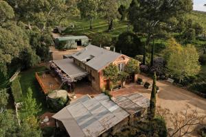 an aerial view of a house with a roof at MARYBANK ESTATE - BARN LOFT in Montacute