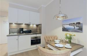 Kuchyň nebo kuchyňský kout v ubytování Baltischer Hof Apartment 69