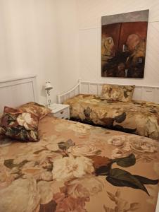 Postel nebo postele na pokoji v ubytování Old Colony Inn
