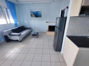 TV a/nebo společenská místnost v ubytování Seaside house