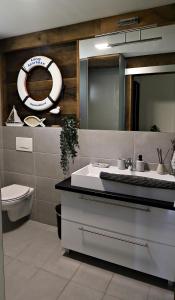 Kúpeľňa v ubytovaní Lóczy Apartman