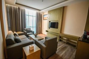 TV a/nebo společenská místnost v ubytování Frankincense Hotel Muscat فندق اللبان مسقط