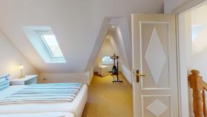 En eller flere senge i et værelse på Senbloom Huis HT 2