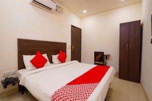 Ένα ή περισσότερα κρεβάτια σε δωμάτιο στο Hotel O by OYO Sunshine