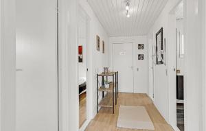 a hallway with white walls and a white ceiling at Nice Apartment In Bindslev With Wifi in Bindslev