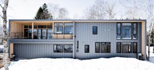 a modern house in the winter with snow at Hiiragi by H2 Life in Niseko