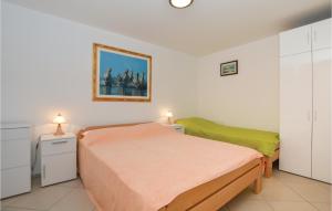 Postel nebo postele na pokoji v ubytování Beautiful Apartment In Portoroz