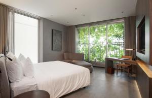 Katil atau katil-katil dalam bilik di M Hotel Danang