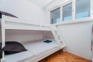 Ένα ή περισσότερα κρεβάτια σε δωμάτιο στο Apartman LARA