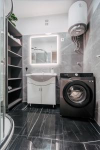 Η κουζίνα ή μικρή κουζίνα στο Apartman LARA