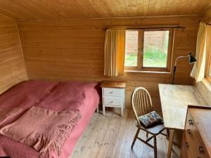TV a/nebo společenská místnost v ubytování Bhumi's farm