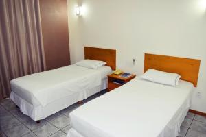 Postel nebo postele na pokoji v ubytování Hotel del Príncipe