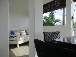 Posezení v ubytování Chalets Bougainville