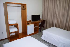 Postel nebo postele na pokoji v ubytování Hotel del Príncipe