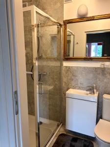 Kúpeľňa v ubytovaní Apartament centrum Szczytno Mazury + 7 fotografií
