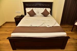 Voodi või voodid majutusasutuse SAK Royal Residency 2 kms from Mysore Palace toas