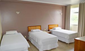 Postel nebo postele na pokoji v ubytování Hotel del Príncipe