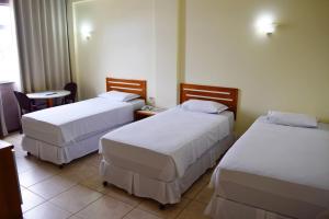 Postel nebo postele na pokoji v ubytování Hotel del Príncipe