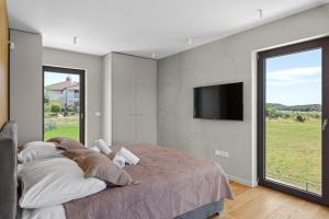 Ein Bett oder Betten in einem Zimmer der Unterkunft Lazy Olive