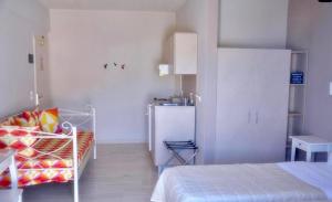 Una cama o camas en una habitación de Sirene Villas