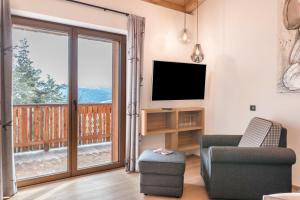 TV o dispositivi per l'intrattenimento presso Schartneralm Zirbel Family