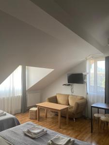 Postel nebo postele na pokoji v ubytování Hotel Cité